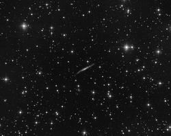 Una galassia di taglio nei Gemelli